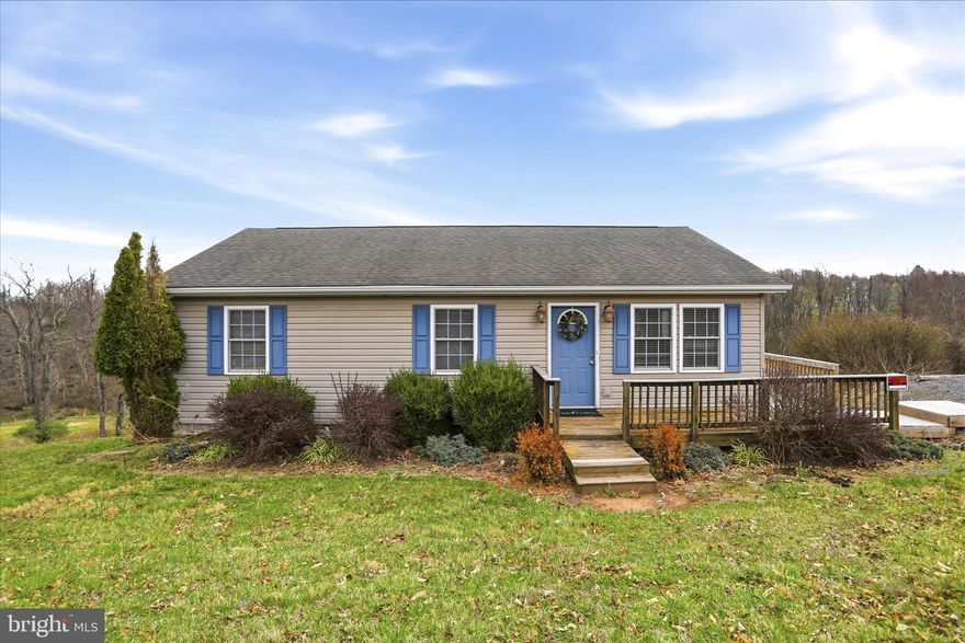 This charming 3 bedroom, 2 bath Ranch home nestled on .78 acres is just waiting for you to make it your own!  The traditional floor plan offers an inviting living room, cozy country kitchen, and primary bedroom with ensuite bath.  A full walkout basement offers tons of storage or potential to finish for additional living space. Large deck lets you relax and enjoy the outdoors.  Ideally located just minutes from shopping, commuter routes and Hampshire Memorial Hospital.  Schedule your private showing today!