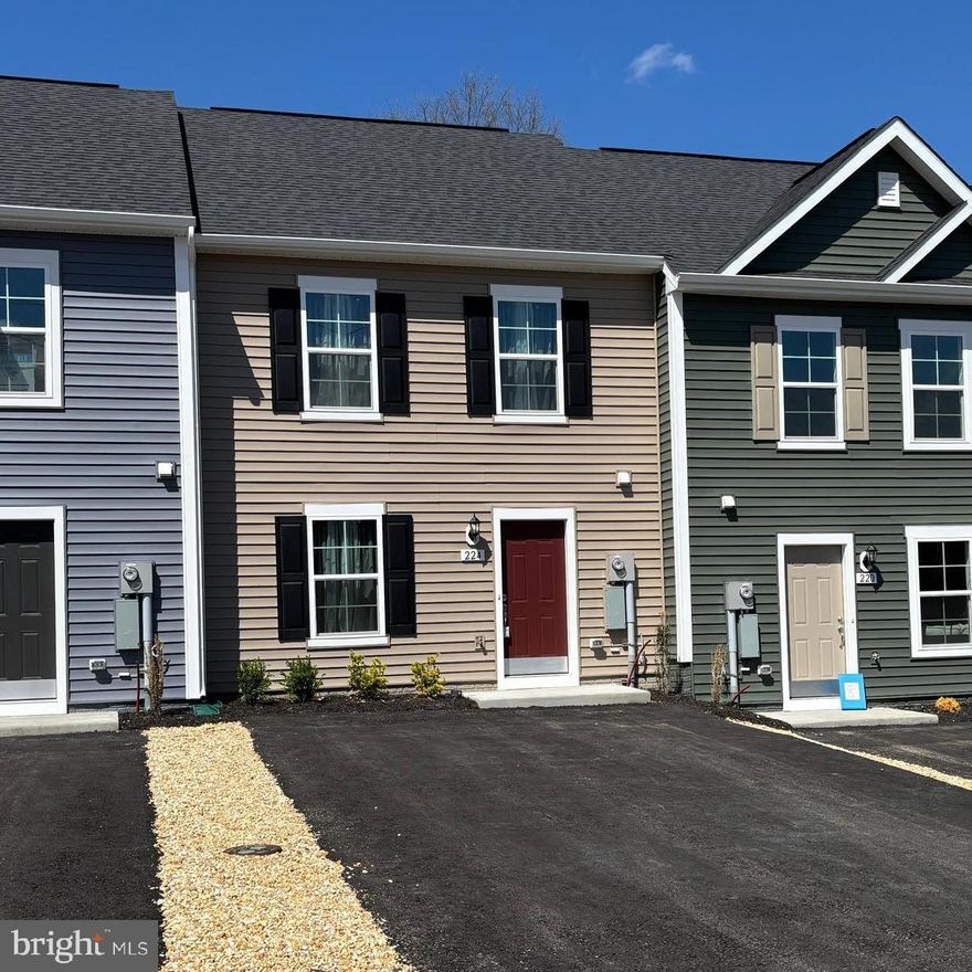Welcome home to brand new 224 Gentle Breeze Drive in the Whispering Pines community. Set on a cul-de-sac and backing to trees, this two level town home boast great views on the outside and large open floorplan inside. The main level is open with luxury vinyl plank flooring, brand new stainless steel appliances and an oversized island with room for seating. This unit features a bump out adding room to the main floor. There are three bedrooms upstairs and 2 baths. The primary suite has room for a sitting area, walk-in closet, en-suite bathroom with walk-in shower. The two other large bedrooms share the hall bath. Laundry is on the bedroom level. The driveway is large enough for 4 cars and the cul-de-sac is also open for parking. Conveniently located this home is great for commuting being only moments away from I-81 and only 10-15 from Charles Town. Shopping and food all nearby.