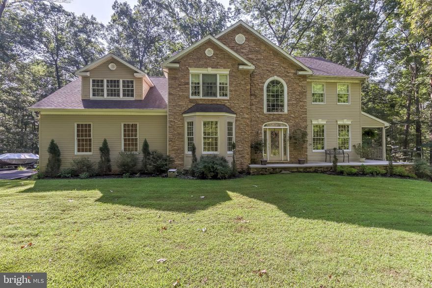JJUST REDUCED! Magnificent 2.64 acre estate in a park like setting! This is not a cookie cutter home! As you enter the property, the winding driveway will remind you of a gorgeous wooded retreat, nestled away in rural Parkton, yet convenient for commuters. But don't let that fool you...this lush, serene setting will not disappoint! Open floor plan, formal dining & living areas along with first floor spacious family room, gourmet kitchen, main level full bath & laundry are only a few of the wonderful features of this Baltimore County retreat. Upper level is showcased with master ensuite, fireplace & sitting area. Nice sized bedrooms sure to please. The unfinished lower level should not be discounted however, as there is a rough in for an additional bathroom, plenty of storage, wood stove already in place & functional and topped off by a "run-in" shed/garage, unfinished area perfect for your tractor, collectible car, man cave, she-shed;) or any other hobbies you have! Walk out the main level deck or the lower level walk out to a yard that will fool you into believing you are in a park! Open space enough to entertain or spread out & wooded enough to be peaceful & private. Your dreams relaxing by an outdoor fireplace are a reality as you experience the spacious deck complete with wrap around porch overlooking nature at it's finest! True perfection in beautiful Parkton! **** Adjacent 1.37 acre lot 9 Glen Dairy is also available for purchase - contact listing agent for details**** (Square footage is incorrect on tax record - actually closer to 4100 square feet with finished area over garage)