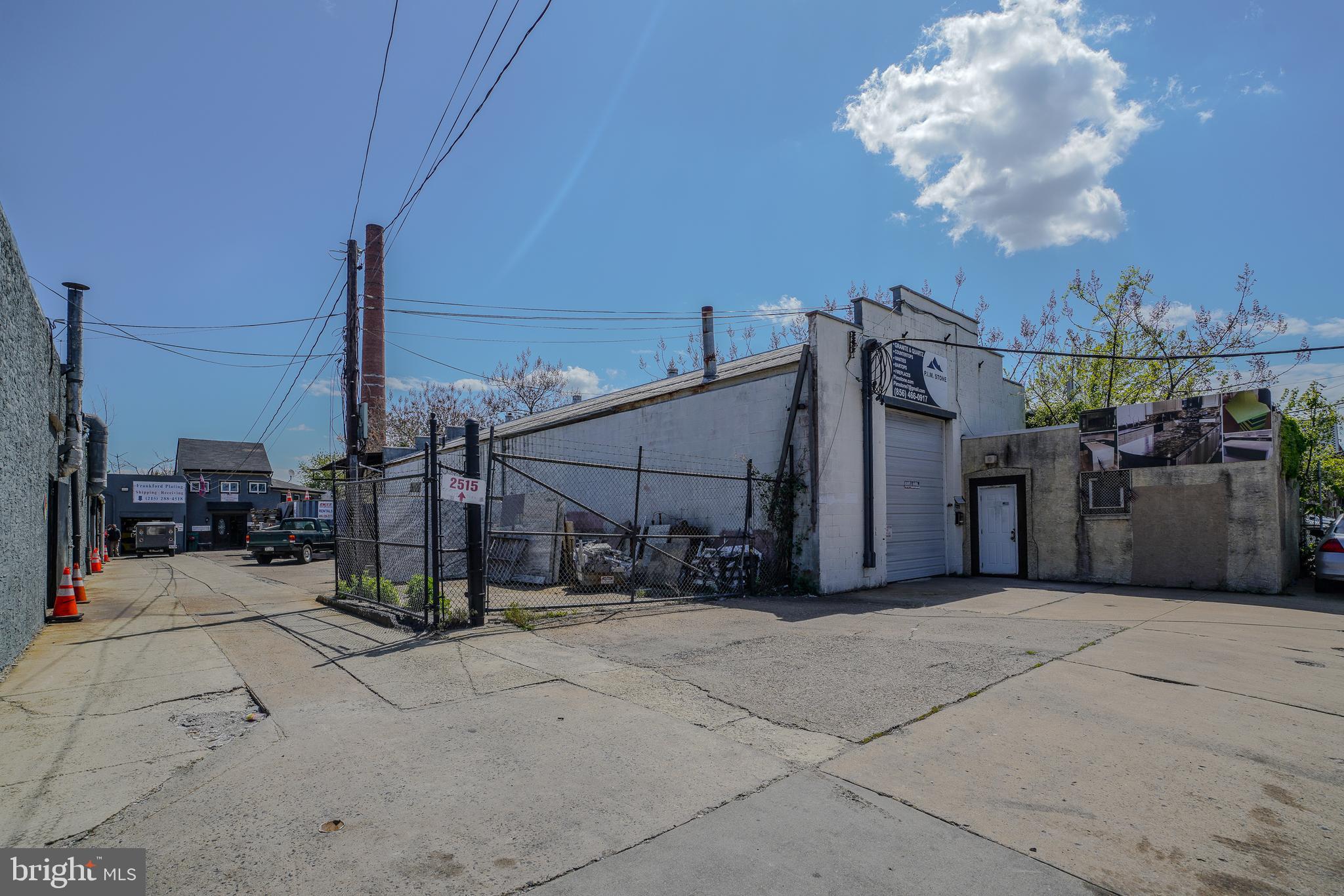 Nestled in the vibrant Bridesburg neighborhood of the city, this commercial property presents a unique opportunity for business owners and investors alike. The current setup hosts three active tenants, the property offers a steady stream of rental income with the flexibility to accommodate your own business venture. This property is not just a building; it’s a strategic investment in one of Philadelphia’s up-and-coming neighborhoods. The property has a couple of office spaces, storage garages, multiple parking spaces, a workshop and a large warehouse all fenced in. Whether you’re looking to expand your business footprint or diversify your investment portfolio. The Bridesburg neighborhood is in a prime location to all major highways and public transportation.