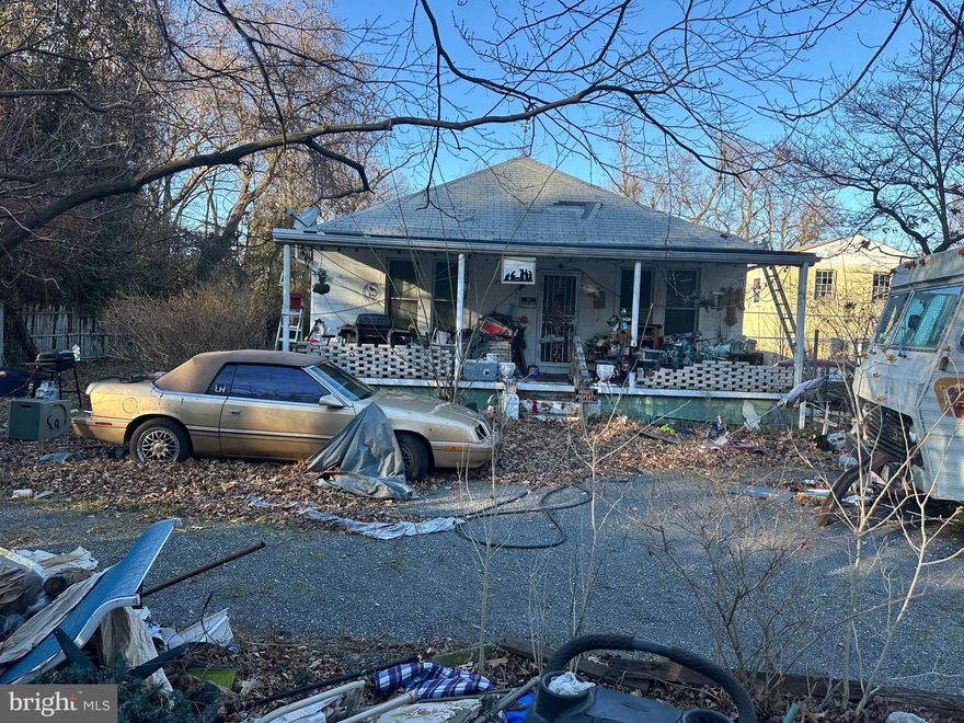 Great opportunity for rehab or possibly new construction. Property consists of two separate Tax ID numbers. One parcel includes a 3-bedroom home with basement, covered front porch, and enclosed porch. The second parcel features a large 30x23 two-story block garage with a full bath on the upper level and potential for an apartment or possible residential conversion (buyer to verify).  Buyer to perform their own due diligence. Estate sale being sold strictly as-is. All contents of the house, garage, and yard convey with the sale.  Will not be cleaned out. 
 Tax ID#0203388221287000 & ID#020338890035126