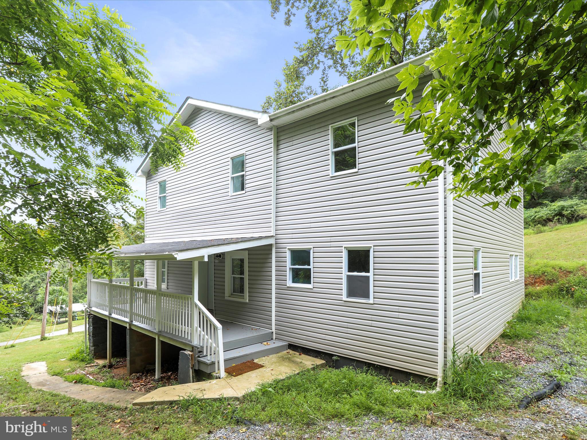Perched on the mountainside in picturesque Myersville, this large three-bedroom, three and half-bath residence offers the perfect blend of natural tranquility and modern elegance. Completely remodeled in 2023, this home features contemporary finishes and upgraded systems throughout with all work permitted by the county. Featuring a two-car garage for additional storage. Situated on a private lot spanning 3.74 acres, this home provides stunning mountain views, abundant space, and exceptional seclusion. Located only minutes to Frederick, with a home warranty included!