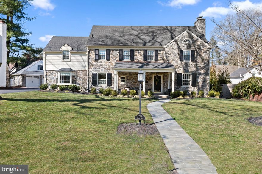 Nestled in the heart of Northside Wynnewood, 206 Almur Lane is an absolute GEM! This stone center hall colonial has been extensively renovated and meticulously maintained by the current owners!  In addition to this home having a premier and convenient Main Line location, with luxury finishes throughout, it is also located in the high school choice zone of Lower Merion School district!  206 Almur boasts 5 bedrooms, 4 full bathrooms, 2 half bathrooms, a completely renovated gourmet kitchen, a 2-car attached garage, and a professionally landscaped private yard and newer flagstone patio!  As you walk up the updated front flagstone walkway, prepare to fall in love!  Enter the home and to the right is a large living room complete with a new stone fireplace and surround sound, and beautiful moldings. This room flows directly into the large dining room which features beautiful new wainscoting.  The heart of the home is the GORGEOUS gourmet kitchen!  The kitchen provides a full range of amenities including an extra-large mitered edge center island, marble countertops, Thermador appliances, custom Omega inset cabinets, new hardwood floors finished to match the original floors, surround sound, and new Pella windows and sliding doors out to the patio.  The light-filled kitchen has sliding doors out to a pristine flagstone patio with surround sound, perfect for entertaining or just relaxing!   The kitchen also offers rear entry into the home, and a DREAM mudroom complete with a laundry area and plenty of cubbies and storage.  The first floor is complete with an additional living/home office and a powder room.  The 2nd floor includes a luxurious primary ensuite bedroom with a walk-in closet and additional closet space with sliding barn doors.  Three additional bedrooms and two full bathrooms complete the second floor.  The third floor offers an in-law or au pair suite with a bedroom, a large closet, and another full bathroom.  The lower level is fully finished with a powder room.  This home is equipped with a whole-house generator and newer Pella windows and roof.   Situated in award-winning Lower Merion School district and settled in an ultra-convenient location, this home has it all!  Walk to the train, Whole Foods, Trader Joe’s, Suburban Square, and much, much more!