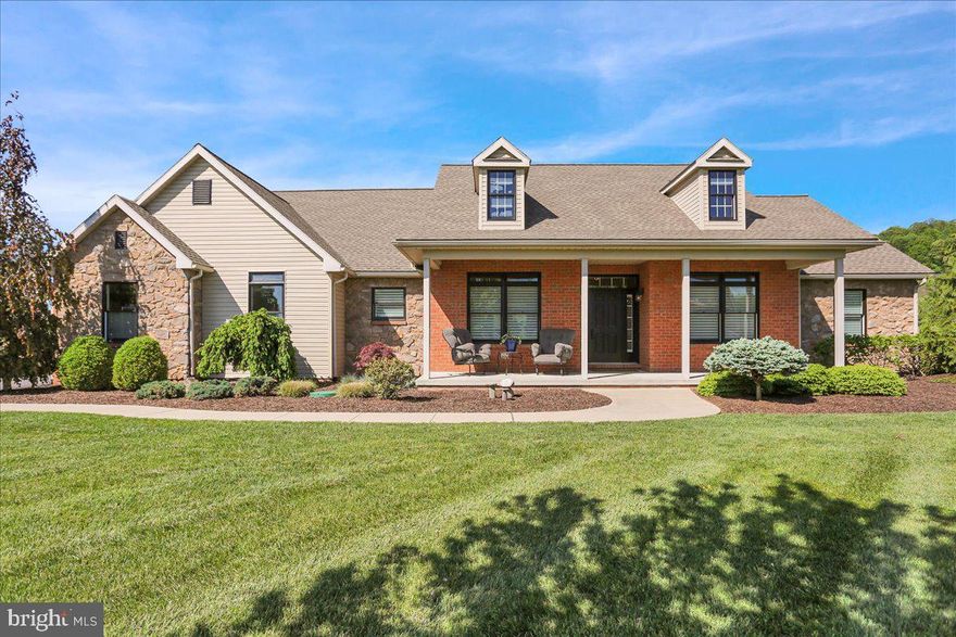 Welcome to this absolutely gorgeous, like-new rancher located in Oley Schools. Step inside to discover a stunning open-concept floor plan, perfect for modern living and entertaining. The main living area boasts gleaming hardwood floors, plantation shutters, and a cozy wood-burning fireplace framed by a beautiful stone accent wall. The spacious entry foyer flows seamlessly into the inviting living and dining areas. The gourmet kitchen is a true showstopper, featuring quartz countertops, a stylish tile backsplash, crisp white cabinetry, a center cooktop island and top-of-the-line appliances—including an induction cooktop, wall oven, and a refrigerator with two drawers. This home offers four bedrooms and two full baths. The luxurious primary suite includes California closets and a renovated bath with a double vanity and walk-in shower. The conveniently located laundry room includes a sink and extra storage. An unfinished basement offers endless potential for future expansion or storage. Outside, escape to your private backyard oasis. Enjoy summer days by the stunning in-ground saltwater pool, or entertain under the large covered patio and custom paver area with built-in grill—perfect for relaxing or hosting guests. Additional features include a brand-new patio door, a three-car side-entry garage, and exceptional curb appeal. Don’t miss the opportunity to own this spectacular home. Call today for more information or to schedule your private tour!