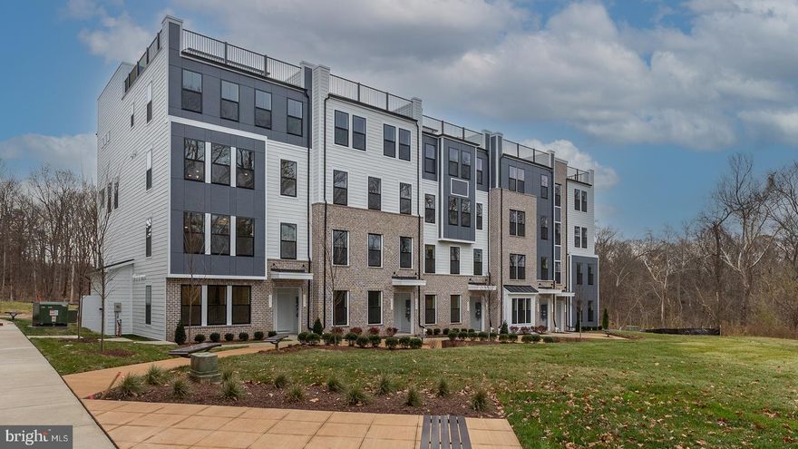 **OFFERING UP TO 20K IN CLOSING COST ASSISTANCE WITH USE OF APPROVED LENDER AND TITLE.**
Enter the Clarendon from either the main front entrance or the private entrance through the rear garage. Both entry points lead to the main living level which opens to the dining room and an adjacent powder room. The center kitchen showcases an open design with upgraded stainless steel KitchenAid Appliances, a pantry, and an oversized 12' island. Continue to the rear of the main level, where the great room seamlessly connects to an outside covered lanai. The primary suite includes an enormous walk-in closet and an ensuite bath equipped with a dual sink vanity, a walk-in shower with a seat and a private water closet. Additionally, there are two generously sized secondary bedrooms, a full bath with a dual sink vanity, and a conveniently placed laundry room on the upper level with a wash basin and included washer and dryer.