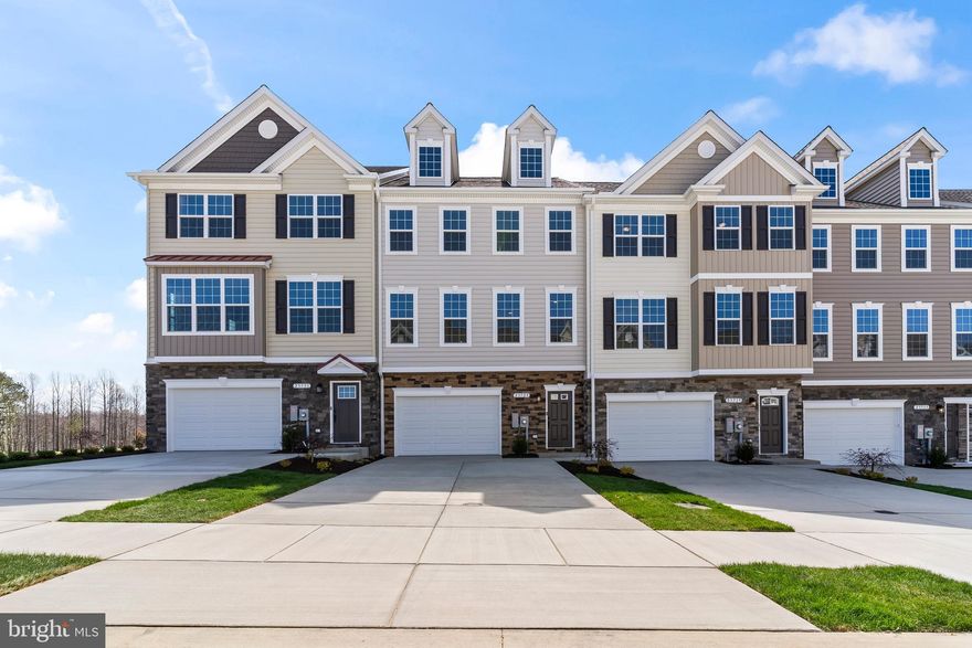 ***SPRING SPECIAL  $5,000 Builder Credit Plus $12,500 in Closing Help with Builder's preferred lender and title co*** (special is for this Homesite #99  Madison D3 only). 

***Available NOW*** Homesite #99  Madison D3:  Welcome to Meadows at Town Run.... Leonardtown’s Newest Townhome Community by Quality Built Homes! Discover the Madison-D3 Interior Unit, a thoughtfully designed 3-level townhome offering 2,554 sq ft of beautifully finished living space. This interior unit features an oversized one-car garage and an entry-level flex space that includes built-in cubbies and coat hooks, plus a versatile room that can function as a fourth bedroom, guest suite, or recreation room, complete with a full bath and closet. 

The main level boasts a spacious and open kitchen with Quartz countertops, brushed nickel fixtures, a center island, large walk-in pantry, and breakfast nook. The open-concept family room flows seamlessly from the kitchen to a 14x12 maintenance-free deck overlooking a fenced backyard—perfect for outdoor entertaining. 

Upstairs, retreat to the owner’s suite with tray ceiling, walk-in closet, and a luxurious Deluxe Signature Shower by QBHI featuring floor-to-ceiling tile, dual showerheads, a built-in seat, ledge, shelving niche, and recessed lighting. Two additional bedrooms, a full hall bath, and a convenient laundry room complete the upper level. 

Community amenities include sidewalks, a swimming pool, recreation center, pickleball and tennis courts, and playgrounds—all located in the heart of charming Leonardtown, Maryland.

Come experience the unmatched quality and thoughtful design that sets Quality Built Homes apart. Schedule your tour today!  Photos shown are representative and intended to illustrate a similar finished townhouse.
