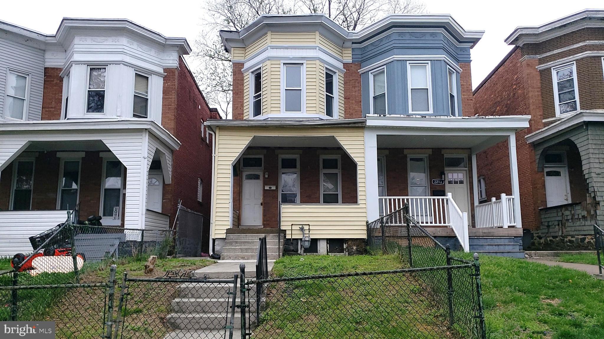 4BR/ 2 BA semi detached townhome with a rear porch that leads to a fenced yard. The home is conveniently located to major travel routes, shopping and restaurants.