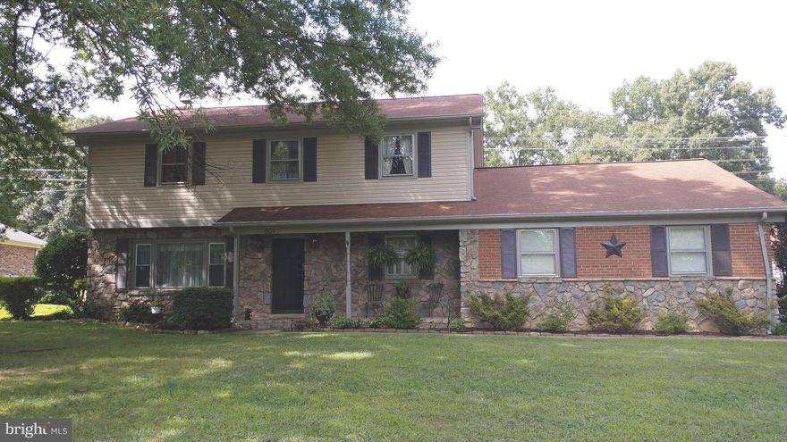 Spacious home adorned with stone and brick, corner lot.  Beautiful kitchen, family room with custom stone wall and fireplace, sunroom with tons of light that leads to a backyard with patio and large shed.  Large master bedroom with updated tiled shower and lovely vanity. Additional bedrooms are great sizes and hall bath is tiled and beautiful!  Formal dining and living rooms. Move in ready!