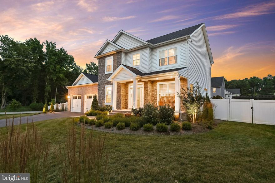 *Better than NEW* Gorgeous 4 bedroom/3.5 bath home located in the waterfront community of Turnbull Estates! Newly constructed in 2020 with top of the line owner selected upgrades to include, but not limited to: Gourmet kitchen with large island, gas top stove, cabinet under lighting, upgraded kitchen SS appliances, quartz countertops in the kitchen, bathrooms & laundry center, hardwood flooring, custom window treatments throughout, extensive custom-designed hardscaping, landscaping, underground irrigation system, exterior landscape lighting, and so much more! Oversized two-car garage with mudroom entry that opens into the laundry center; all conveniently located together on the main level! Expansive family living area with gas fireplace that opens into the kitchen and breakfast-dining spaces; perfect for everyday living and gatherings with friends & family. Main Level Primary En Suite with backyard views out onto the garden, spa quality bathroom with dual sink vanity, luxurious soaking tub, separate glass shower and walk-in closet! On the upper level you will find three additional ample sized bedrooms, two more full baths, and a loft-style recreational space perfect for the home office/study, art studio, gaming space or play area. Welcome guests into your backyard along the stone pathway and into your private oasis! Beautiful patio spaces, flowering trees & shrubs,  and custom made pergola with sunshades (perfect for those bright sunsets). The current owner didn’t desire any additional living space, but if your lifestyle requires a little more, then you're in luck...the unfinished basement is a diamond in the rough! An expansive open space of bonus square footage, tall ceilings, bathroom rough-in, glass sliding door with access to the back yard; an ideal space for anything you may want! Turnbull Estates is a water-privileged community with access to the South River and Glebe Bay where you can enjoy fishing, kayaking, paddle boarding, or canoeing! The water access points are a short walk, or bike ride, from your front door! Excellent location for commuting with easy access to Rt 50 and 97, tons of shopping options, restaurants, doctors/medical needs, the Edgewater Library, and South River Schools!