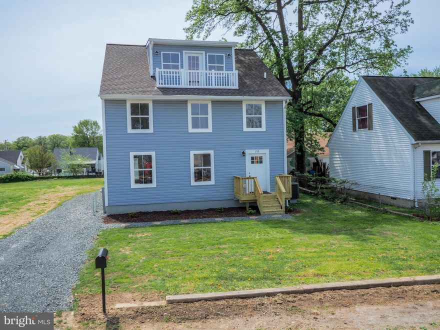 Square Footage is incorrect in tax records.  Total Square Footage is 2,324!  No detail was missed in this beautiful Craftsman style home.  Walk into the open floorplan of the first floor offering gleaming floors, a large great room & dining room with stylish columns, powder room, and a gorgeous kitchen awaiting family dinners with plenty of room for too many cooks.  This floor also has a small bedroom that could also be used for an office, den, study, craft room, or home school. Matching hardwood stairs w/painted risers lead up to the second floor that boasts a bright hall bath, laundry closet w/stackable units, and 3 bedrooms which one offers another remodeled full bath.  Carpeted stairs lead to the top level to the Master Suite with it's own bath and plenty of natural light.   Exit the glass door onto the upper deck that over looks Bear Creek to enjoy beautiful sunsets every evening.  Detached garage in rear yard has electric for the Man Cave or She Shed! (Home is 2,324 sq. ft.)  Vacation at Home:  Stouten's Bear Creek Marina offers a boat ramp, slips, and water access.  In the summer time, enjoy a snowball at the Marina.  Walk to  Waterfront dining at The Seahorse Inn and Season Mariner.  Sparrows Point Country Club is across the street where you can take a dip in the pool and/or take in a day of golf (need to call for membership details). North Point State Park is just a  few miles away.   Live here and work elsewhere?  Easy Access to 695 and the Key Bridge!!!
