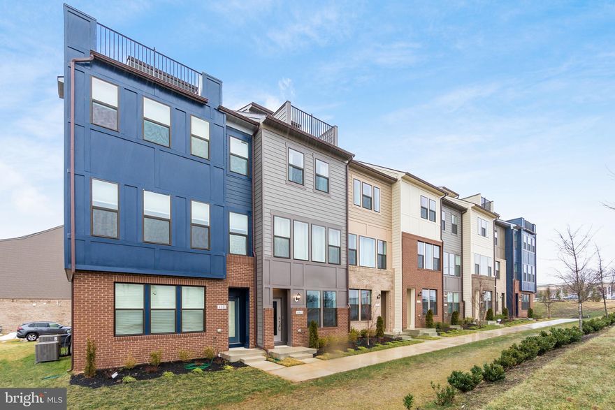 Welcome to 4803 Vista Green Lane, a stunning, modern townhome in the desirable Vista Gardens community of Lanham, Maryland. Built in 2024, this Aldridge model offers contemporary luxury with a spacious 2,329-square-foot layout across four levels. Designed for modern living, the open floor plan seamlessly connects the living, dining, and kitchen areas, creating a bright and inviting space. The gourmet kitchen features sleek countertops, a large island, Whirlpool stainless steel appliances, and double wall ovens—perfect for cooking and entertaining. Three ensuite bedrooms provide privacy and comfort, each designed with stylish finishes. A rear-load garage enhances curb appeal . A private 10x14 deck off the kitchen and rooftop deck offers a great outdoor retreat. Additional modern amenities include a programmable thermostat, natural gas heating, central air conditioning, and energy-efficient appliances for year-round comfort. Located in a peaceful yet convenient neighborhood, the home offers easy access to shopping, dining, entertainment, and major commuter routes. Residents of Vista Gardens enjoy well-maintained common areas and a picnic space, adding to the community’s charm. This home is a perfect blend of elegance, functionality, and convenience. Don’t miss the chance to make 4803 Vista Green Lane yours—schedule a private tour today!