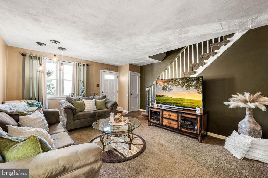 This well-maintained and recently updated Holmesburg home is thoughtfully designed to make you feel right at home. It truly stands out and is a must-see. The front yard is beautifully landscaped with meticulous care, creating a warm and welcoming first impression. Inside, the spacious living room features high ceilings and offers plenty of room for entertaining. The newly renovated kitchen opens directly to the deck, creating your own private outdoor oasis. The finished basement provides additional flexible space for entertaining, relaxing, or a home retreat. A rear driveway and attached garage offer ample parking and added convenience.  Showings begin on January 2nd. Book now to save your spot