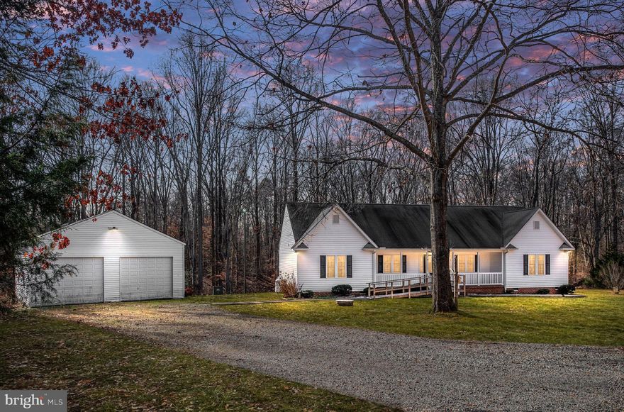 Charming 3-bedroom, 2-bath home on Herring Creek Rd.  in Aylett sitting on 2.58 acres, featuring a massive detached garage, perfect for car enthusiasts, hobbyists or extra storage space. This well-maintained home includes a spacious living area, updated kitchen, and a picturesque backyard. It also showcases hardwood floors, an updated primary bathroom, a fireplace, and a great floor plan!  Enjoy the tranquility of the surrounding nature while being conveniently located between Fredericksburg and Richmond. Perfect for those seeking a cozy retreat in a peaceful area with the added bonus of ample storage. Don't miss the opportunity to make this house your home. Less than 20 minutes to Kings Dominion, 40 minutes to Richmond, under 1 hour to Fredericksburg! Stainless steel appliances, upgraded HVAC, tankless water heater, wood stove in the garage, and so much more!  Schedule a showing today!