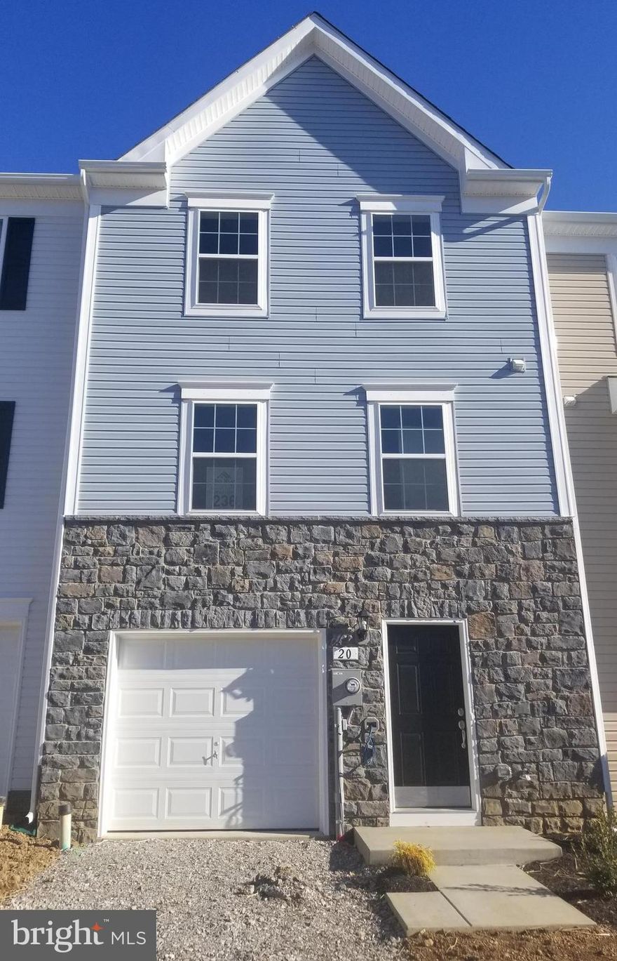 THIS HOME IS MOVE IN READY! BEST PRICING IN COUNTY! WANT CLOSING COSTS & 100% FINANCING?  Dan Ryan Builders at Stonebrook Village spacious York II garage townhome stone front detail, 8x12 Morning Room plan opening up space on all 3 finished levels!  Huge OBR & deluxe bath. Island kitchen opens to sunny space to have morning coffee & gather!  Double rec room w/ bath rough in. 2x6 construction!