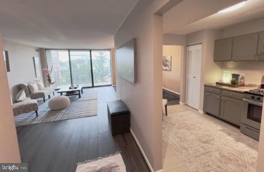 Almost 900 square feet on the 7th floor with Southern exposure balcony and city views clearing the mature and manicured trees and adorable courtyard below, this unit is beautiful inside and out. The one bedroom,  one bathroom condo with assigned, secured, garage parking is in the heart of Rockville!!! Conveniently located less than one block from the Rockville Metro, Marc Train, and  Rockville Town Center-which is super popular year round with its movie theatre, restaurants, shopping and an outdoor ice skating rink  in the winter,.  There is a large walk-in closet, an over-sized living room with tons of natural light, a coat closet in foyer entrance, linen closet in hallway, a pantry and a proper dining room with space to spread out. The exercise room is located in this building on the first floor, parking space is #45.  There is  a community pool and gorgeous landscaping throughout the property. Pets are welcome.  Own your own piece of historical charm at the cleverly designed American Centre. Built in the early 70's this Montgomery County gem was part pf Rockville's Mid-City Urban Renewal Project and received awards for its excellence in urban design and planning.  More than 50 years later, it continues  to impress! Commuting is even a breeze from here with  access to 270, 495, and the ICC, so getting around the DMV for work, play or travel couldn’t be any easier….although, no-one would blame you if you didn’t want to leave but rather stay in ENJOY your new home:) Open house this  Sunday, May 7 from 2;00-4:00 pm!