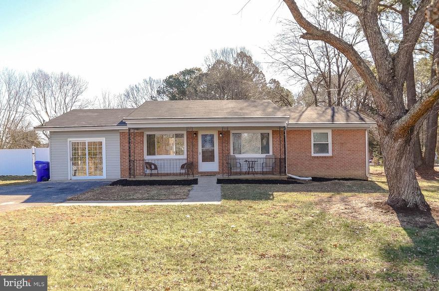 Envision yourself in this inviting, updated, immaculate, move-in ready home.  Situated on nearly one acre in a quiet, waterfront community.  Large yard that backs to trees for the utmost in privacy.  Move-in just in time to enjoy your private in- ground swimming pool with beautiful landscaping and vinyl privacy fence.  Newly planted specimen Cedar trees have been placed along both sides of the property offering even more privacy as they grow.   After a day of outdoor enjoyment, you can relax with a beverage and sit out on your cozy front porch to enjoy the waterview.  Prepare your meals in your open and airy kitchen complete with new stainless steel appliances.  Easy access to the pool and patio area through large sliding doors.  New luxury vinyl plank flooring throughout main living areas.  Neutral color carpeting in bedrooms to keep your feet comfortable year round.   Bathrooms are updated with modern features.  Exquisite new lighting is installed throughout home.  Large bonus room is perfect for your home office, gym, family room or other living space.  Separate laundry room with Energy Star washer and matching dryer is located just off of the kitchen for your convenience.   All in all, this home is absolutely gorgeous and comes complete with a one year home warranty.