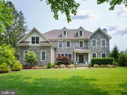 Exceptional 5 bedroom 5 & 21/2 bath 6-year-old Emma construction, walking distance to the historic Gladwyne district, offers a sparkling turn-key interior. Highly styled and finished on all three floors with a spectacular spa retreat in the lowest level, wine storage, large recreation area and generous primary storage. The time-honored classic center foyer plan feels up to the minute, fun and fresh with spacious room sizes and seamless flow, highlighted by handsome hardwood flooring, living room and great room fireplaces and an abundance of natural light from floor to ceiling windows and French doors. Outfitted and designed for effortless serving and everyday meal prep, the kitchen features Sub-Zero refrigeration/freezing Wolf 6 burner gas range with double oven and Bosch appliances. An oversized stone topped center island seats four easily, while steps away and informal breakfast room, embraced by views of the deep blue-stone terrace, fully fenced and densely, professionally landscaped rear yard, offers additional seating. The open floor plan leads from the kitchen and dining space to the volume -ceiling Great room. Brightened by two walls of windows and warmed by a gas burning fireplace, this space delivers the ultimate invitation to gather and relax. On the opposite side of the house, tucked behind the Living Room and off the rear Foyer for maximum privacy, a large home office provides ample work or quiet space. Two powder rooms, a well outfitted butler s pantry, walk-in storage pantry and mudroom/informal entrance complete this level.Ascend either the front or back staircase to five generous bedrooms. Two equally sized rooms share a Jack and Jill bath. While two other bedrooms, one with large seating area, ideal for longer stay guests offer private, en-suite baths. The Master suite enhanced by a sophisticated grey and white palette, offers an indulgent bath complete with soaking tub, seated shower and separate custom vanities. The tray ceiling in the bedroom adds additional architectural detail and the south-eastern exposure gives desired morning light. Walk-in fully outfitted separate his and her closets complete the suite. A large laundry room is also found on this level.Superior location, beautifully presented.