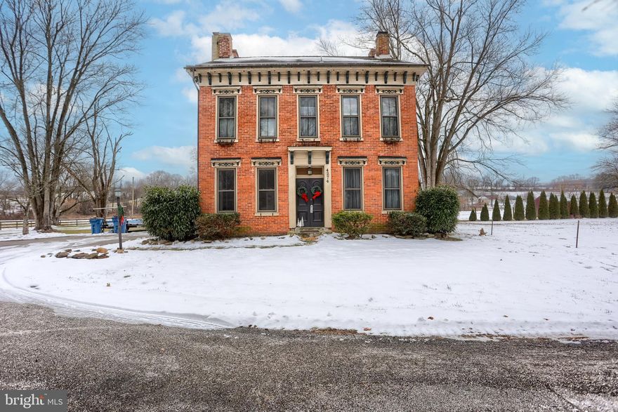 Searching for that perfect country retreat? Look no further. With over three acres of land for optimal privacy (and your horses), this colonial hideaway boasts its original wide plank wood floors, newly updated kitchen with stainless steel appliances, and freshly painted rooms. Walk the over three acres of land, plan crops in the garden plot ready for this year’s planting season, enjoy the walnut and maple trees that shade the yard surrounding the house, sit on the porch swing and enjoy the country evenings or lounge and talk on the expanded back patio. This home is filled with character, charm, and love—perfect for your antiques or more contemporary furniture. I can’t forget to mention the horse barn with open living space above just waiting to be decorated to suit your taste. 

This 1880s home has withstood time and change. Rumor has it the driveway used to be railroad tracks and the home was a bed and breakfast that may have patronized a former colonial President. Grab your own slice of history on Russell Lane. *Open House January 18 from 1-4pm.*