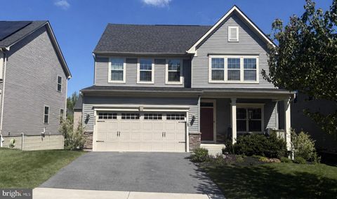 Photo of 9809 Sawmill Branch Trail, ELLICOTT CITY, MD 21043 (MLS # MDHW2067470)