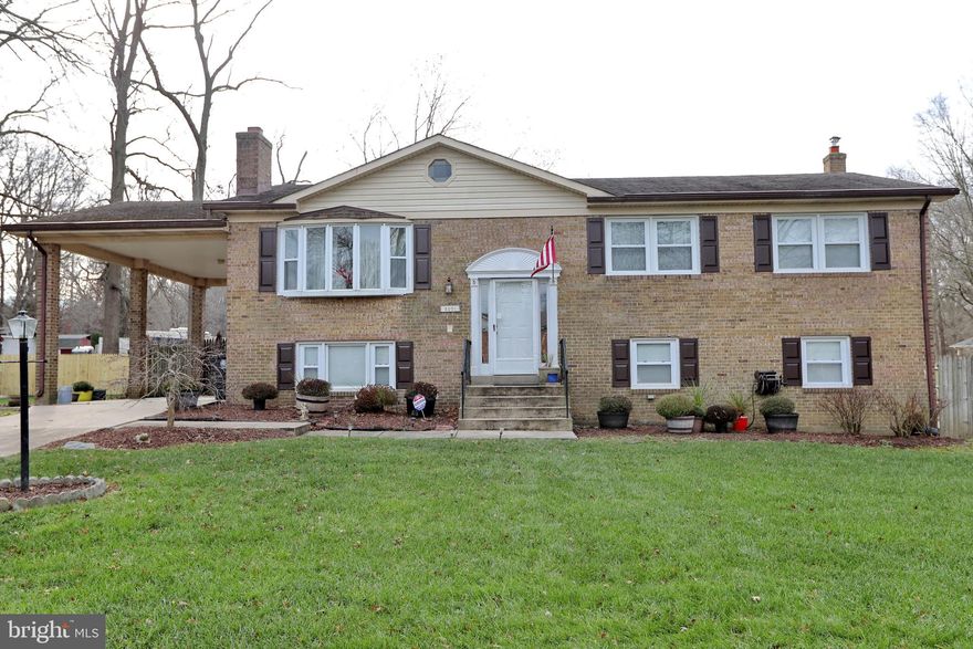 Welcome home to 8001 Knollwood Street. Beautiful home on a corner lot located in much sought after Clinton Acres. Recently remodeled split foyer, upgraded Bathrooms and  Kitchen has beautiful upscale wood cabinets and 2 large pantries. Lots of storage and cabinet space. Off the Kitchen is a wonderful enclosed Sun Porch by Patio Enclosures. This overlooks the Gunite pool with a new cover and a fenced in yard. for your entertaining. This home boasts hardwood floors in the kitchen and hallway and carpeting in the Bedrooms and Livingroom.  Fully finished and remodeled Basement with a Bedroom and Cedar Closet , Full Bathroom with a jetted soaking tub and plenty of storage under steps.  Also to keep you warm in the cooler months a fireplace with a wood stove. .WHOLE HOUSE GENERATOR completes this home in case of power failure.  Convenient to Shopping, Schools, Restaurants, Convenient to Rt#5 and close to the  beltway. THIS HOME IS BEING OFFERED AS IS..