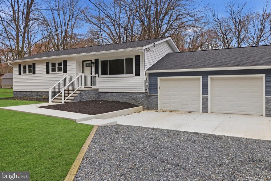 ***Back on Market, Complete Brand New Septic being installed, perc test and permits already complete.  Work should be complete in next 2 weeks. Previous buyer didn't want to wait for the work to be complete***

Experience the luxury of new construction without the wait. This meticulously renovated 3-bedroom, 2-bathroom home has been stripped to the studs and rebuilt with modern elegance. Inside, you’ll find brand-new drywall, stylish flooring, and a stunning primary suite featuring a private, custom-tiled bath. The chef-inspired kitchen shines with quartz countertops, stainless steel appliances, and a chic tile backsplash.
No detail was spared on the exterior: a new roof, siding, and stone accents provide instant curb appeal, complemented by a fresh front porch and an enlarged driveway. Situated on a sprawling one-acre lot, the property also includes an upgraded garage with new doors and openers. With all-new HVAC and major systems, this home offers total peace of mind in a tranquil setting.