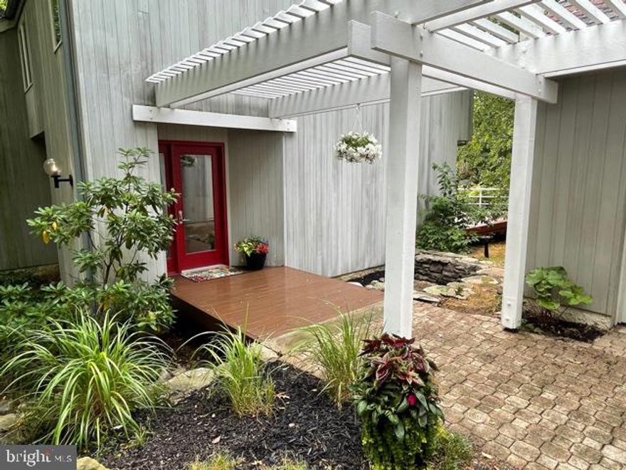 INCREDIBLE CUSTOM MID-CENTURY HOME Nestled in PHOENIX in the Wonderful Community of WINDEMERE with over 3,000 square Feet!  Designed & Lived in By ARCHITECT, ROBERT T. HOFMANN for 40 years as his Personal Residence.  This STUNNING HOME Features 4 BEDROOMS, 3 FULL & 2 HALF BATHS and 2 OVERSIZED GARAGES, an AWESOME UPGRADED Kitchen/Family Room with Stainless Appliances, GAS STOVE, FANTASTIC LIGHTING, GRANITE COUNTERS, WOOD BURNING FIREPLACE and Access to a SPACIOUS DECK Overlooking the LOVELY LANDSCAPED YARD, Tile & HARDWOODS Throughout Main Level, SPECTACULAR LIVING ROOM with VAULTED WOOD CEILING and Sliding Door Access to another Smaller Front Deck, LOVELY DINING ROOM with Wood Floors and Deck Access, GORGEOUS OFFICE/STUDY with WALLS OF WINDOWS, Built-ins and VAULTED WOOD CEILING, CUSTOM, Main Level Continues with a Custom FULL BATH and LOVELY Powder Room with Laundry, Wide Carpeted Staircase to UPPER LEVEL PRIMARY BEDROOM which Features a SPECTACULAR Primary Bath with Walk-in Closet & Double Sink Vanity, Also on the Upper Level are 3 ADDITIONAL BEDROOMS and ANOTHER LOVELY FULL BATH, The LOWER LEVEL Features a Built-in BAR with Sink, a GAME ROOM with POOL TABLE, a SIZABLE BONUS ROOM with Walk-out Access to Patio & Yard and a Spacious UTILITY ROOM with Shelving , Work Bench and Utility Sink. THIS HOME IS NOT TO BE MISSED! SHOWS BEAUTIFULLY and has the potential for 6 Bedrooms! Showings will begin on Friday, July 23rd! Schedule a Tour Today!