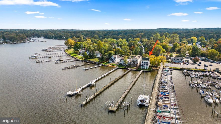 Captivating Manhattan Beach Waterfront Residence – A Scenic Retreat on the Magothy River!
Discover waterfront living at its finest with this charming and meticulously updated 3-bedroom home, offering stunning vistas of the Magothy River. Your very own private waterside decks provide the perfect vantage point to soak in both sunrise and sunset views.

As you step into the foyer, you're immediately greeted with breathtaking 180° panoramic river views. This craftsman-style home boasts 12" wide plank wood flooring throughout the main level, infusing it with an abundance of charm and character.

The open and inviting layout seamlessly connects the gourmet kitchen, living room, and dining areas, all graced by vast windows that frame the magnificent river scenery. The kitchen is a culinary enthusiast's dream, featuring a convenient peninsula with seating, high-end appliances, crisp white shaker cabinetry, elegant quartz counters, and ample storage space. With three double doors leading to the rear deck overlooking the river, you can effortlessly transition between indoor and outdoor living.

For those who need to work from home, a private office on the main level offers a peaceful and productive space. The primary suite on the upper level is a true sanctuary, featuring its own deck, dual walk-in closets, and a bathroom with dual access to an oversized shower. Two additional bedrooms and a full bathroom complete the upper level, providing comfortable accommodations for all.

The lower level, currently unfinished, offers a wealth of storage space and presents limitless possibilities for future customization to suit your needs.

As a boater's paradise, you'll enjoy easy access to the newer 300' dock equipped with two boat lifts. This exceptional property is a rare find, offering a perfect blend of modern comforts and timeless riverfront serenity. Don't miss the opportunity to make this slice of paradise your own.

Completely renovated in 2007 and designed by Cathy Purple Cherry. Recent kitchen updates in 2021.  Coveted detached garage with parking for 2, additional driveway offers overflow parking.  Stunningly landscaped and manicured front gardens offering privacy.  A perfect home for the true water enthusiast!  Schedule your private showing today!

**Manhattan Beach offers a voluntary community association with private beach access, playgrounds, water access, kayak/SUP storage & more! Severna Park Schools