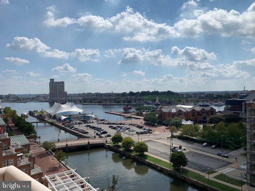 Located right at the tip of Harbor East, the Scarlett Place building is located right along the water and this unit has water views that will amaze you.  Almost 1200sf of living space this 1 bedroom 1.5 bath residence has views of the water from both the living areas and the bedroom.  There is a balcony off the living space for you to relax and enjoy or go down to the pool or fitness center at your leisure as they are right in your own building.    Water, sewer and parking are included in  your rent.  Come see today.