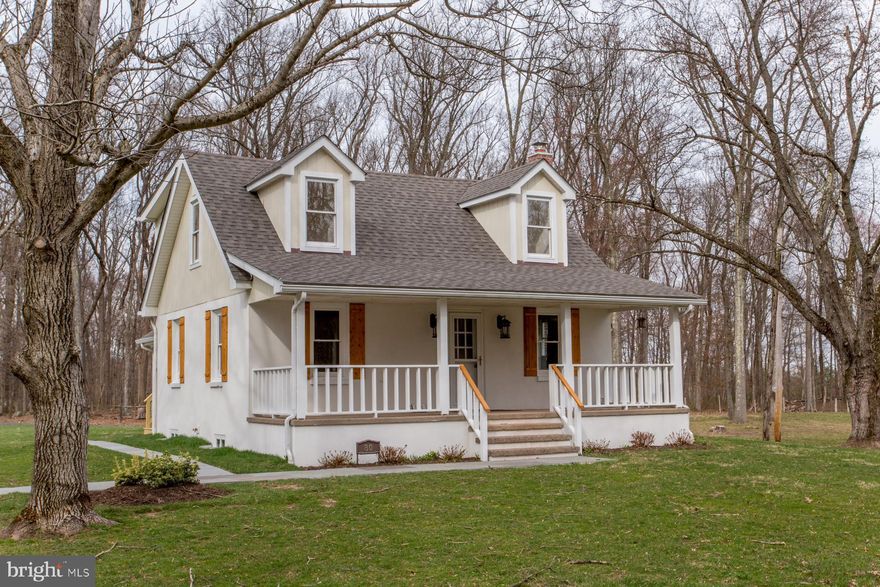 This pristine cottage sits amidst 2.7 acres of verdant lawn in a quiet area of Tinicum Township. Perfectly refurbished, you will know it's the work of a premier local builder the minute you arrive. Finished to suit the most refined standards, it is over the top with upgrades. Oak hardwood floors (the same type used in high end homes), fine fixtures, brass floor outlets and upgraded granite in the kitchen and baths.  Located in the Delaware River Valley, it's less than 5 minutes to Frenchtown, NJ. Easily reach Doylestown and New Hope to the south. The serene neighborhood is what the locals like, there is room for a garden or plenty of lawn for croquet or sitting and relaxing. The front porch is famous for its sweet breeze and large size with plenty of  room for entertaining and dining . A two car detached garage with additional storage room accommodates vehicles and additional possessions with ease. This is living in the lap of luxury at a fraction of the cost.