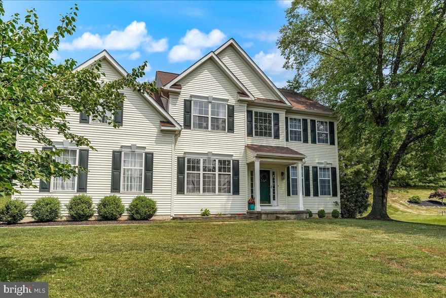 Welcome home to 7 Morris Drive, an exceptional well maintained four-bedroom colonial home with two full baths on the upper level plus a half bath on the main level, nestled on a beautiful private tree lined yard in the sought after Meadow Run community, in the top-rated Garnet Valley School district.  Just around the corner from schools, parks, playgrounds, Brandywine Youth Club fields, Darlington Arts Center, dance studios, major commuting routes to corporate centers, shopping and more. Some of the many wonderful features of this lovely home include an open welcoming and functional floor plan with 9 ' ceilings on the main level, a private tree lined rear yard and outdoor living space including a fabulous stamped concrete patio.   As you walk through the main front portico entrance you're warmly welcomed home into a grand towering center hall foyer with wood floors, custom millwork and a turned staircase.  A formal living room and formal dining room suite feature dark wood floors and are adjacent into the  chef's  kitchen with granite counters, lots of cabinet space, a center island, pantry, and  a tile backsplash, stainless appliances and an adjacent breakfast room that walks out to the lovely stamped concrete patio looking out over the lovely private tree lined back yard.  Adjacent to the kitchen and breakfast room is a large functional family room with a vaulted ceiling, back staircase, and lots of windows for natural light, a cozy wood burning fireplace and gleaming dark wood floors. There is also a private office on the main level. For added convenience, the main level also has a half bath, main floor laundry and inside access to the two-car garage. On the upper-level there is a fantastic Master Bedroom Suite with a walk-in closet and an en-suite tiled bath with a double vanity, soaking tub and stall shower. Completing the upper level are three additional spacious bedrooms and a tiled hall bath with a double vanity.  Recent updated to this home include new siding (2023) and a newer roof (2014). Move right in and enjoy everything this fantastic home and community has to offer !!  Schedule an appointment today before it’s too late.