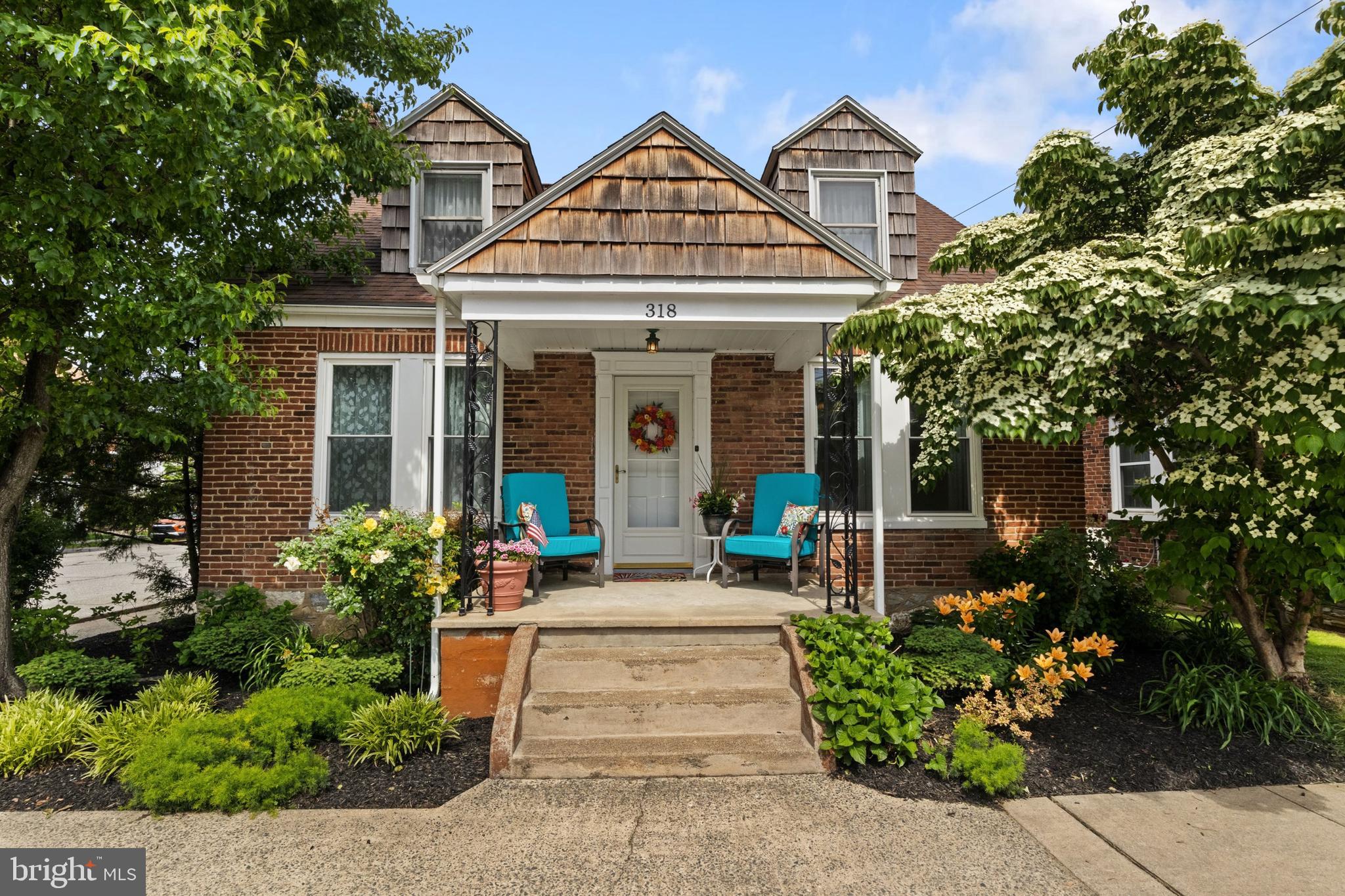 Discover this beautifully maintained Cape Cod-style home, perfectly situated on a generous corner lot and surrounded by lush, professionally landscaped grounds. Located in a warm and welcoming neighborhood just a short walk from the scenic Susquehanna River, this home effortlessly combines timeless charm with modern convenience.
Enjoy ample parking and storage with an oversized, detached two-car garage that’s both heated and insulated—ideal for year-round use. The garage also features a spacious second-floor storage area, providing plenty of room for hobbies, tools, or seasonal items. Please note: A propane tank is required for heating.
A private gated entrance leads to a serene patio, where the sweet fragrance of a blooming mimosa tree invites hummingbirds and butterflies, creating a tranquil outdoor retreat perfect for relaxation or entertaining.
Inside, the home offers both charm and functionality. Recent updates include fully remodeled bathrooms and fresh carpeting on the second floor. The living room and family room each feature a classic brick fireplace, and the cozy bar in the family room makes a perfect setting for gatherings with friends and family.
The second floor, once used as a separate living unit, offers great potential for in-law quarters or expanded bedroom space. The home also includes a large laundry room and a spacious hobby/workshop area with abundant storage—ideal for DIY projects or additional workspace.
Located in the heart of beautiful Wrightsville, you’re just a short walk from local bakeries, restaurants, coffee shops, churches, and a golf course. This home blends timeless character with modern comfort—an ideal opportunity you won’t want to miss!