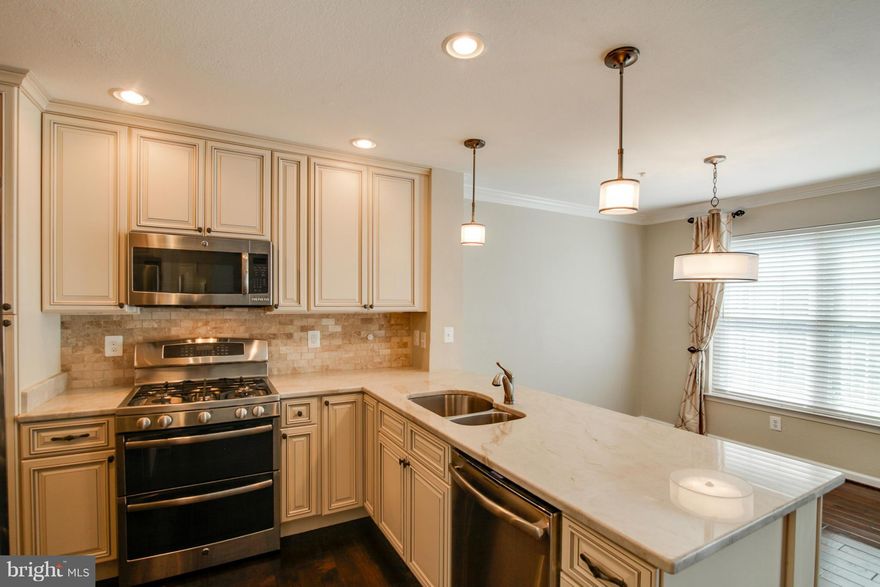 Completely remodeled in 2014. Stunning finishes throughout - 4 1/2" maple hardwoods on the main level, top of the line granite counters in kitchen & baths. upgraded 42" cabinets. GE Profile stainless steel appliances: double door french refrigerator, gas stove w/dual gas ovens, built in microwave, dishwasher. upgraded carpet & pad. trex deck installed 2014. You truly must see inside to appreciate