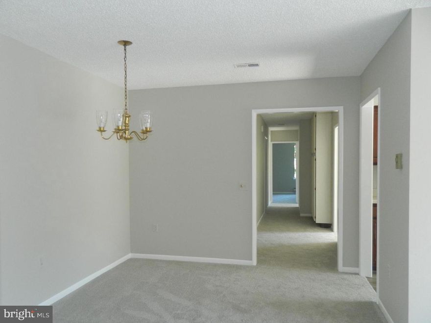 Discover your next home in this serene end-unit condo, perfectly situated overlooking a green forest area. This peaceful retreat offers: Three bedrooms, two full baths with a generous laundry room and side by side washer & dryer. Kitchen extents to a spacious breakfast space. Main bedroom with a walk-in closet and shower is part of unit conveniently located at the end of the building. Short distance from the elevator in a well-maintained building. Ideally priced offering all the benefits of a fairly large property without the burden of ownership. Apply via RentSpree today and make this beautiful condo your next home!