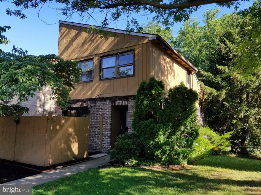 End unit in lovely Flying Hills community. This spacious unit features, 3 bedrooms, 2.5 baths, master suite, living room with wood burning fireplace and a finished lower level.  Front and rear patio areas for privacy. Property needs updating and TLC. Community offers pool, golfcourse, tennis, walking trails, playgrounds, pond and more. T