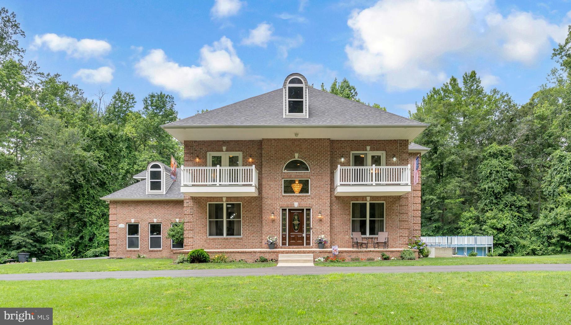 Stunning 3-Level Colonial on 6+ Private Acres with Pool, Solar & More!
Welcome to this beautifully updated 3-level Colonial, perfectly nestled on over 6 acres of wooded privacy, yet just 26 miles from downtown Washington, DC. Freshly painted throughout, this spacious home features brand new carpet, gleaming hardwood floors, and an abundance of natural light.
The main level offers an elegant formal dining room, a dedicated office space, and an impressive first-floor primary suite complete with a fully updated spa-like bath, featuring dual sinks, a walk-in shower, and a luxurious soaking tub. The updated kitchen boasts brand new appliances, countertops and opens to cozy living areas—ideal for entertaining.
Upstairs, you'll find three generously sized bedrooms—one with its own private bath, the other 2 with an adjoining bath, plus an additional bonus room perfect as a playroom, gym, or second office.
The fully finished walk-out basement is designed for ultimate relaxation and fun, complete with a home theater area, bar area and ample space for gatherings
Step outside to your backyard oasis, featuring a Trex deck, charming gazebo, and an above-ground pool with wrap-around decking—perfect for summer enjoyment. The 3-car garage and brand-new roof with energy-saving solar panels complete this incredible package.
Enjoy peaceful country living with the convenience of easy access to the city. This one has it all—space, updates, privacy, and location! PLEASE DO NOT DRIVE BY THIS PROPERTY WITHOUT AN APPOINTMENT !