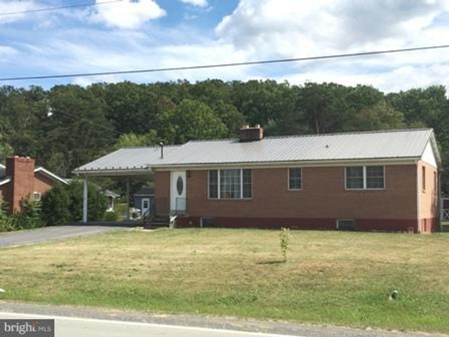 Good news, the basement Water Remediation has been completed by First General Services! Yea!!!  Spacious 3 bedroom brick rancher with wood burning fireplace, hardwood floors, central air, newer metal roof .paved driveway with carport,2 storage barns and a large level lot. Just a short drive to ABL, Woodmark and Cumberland.  Many updates including windows.