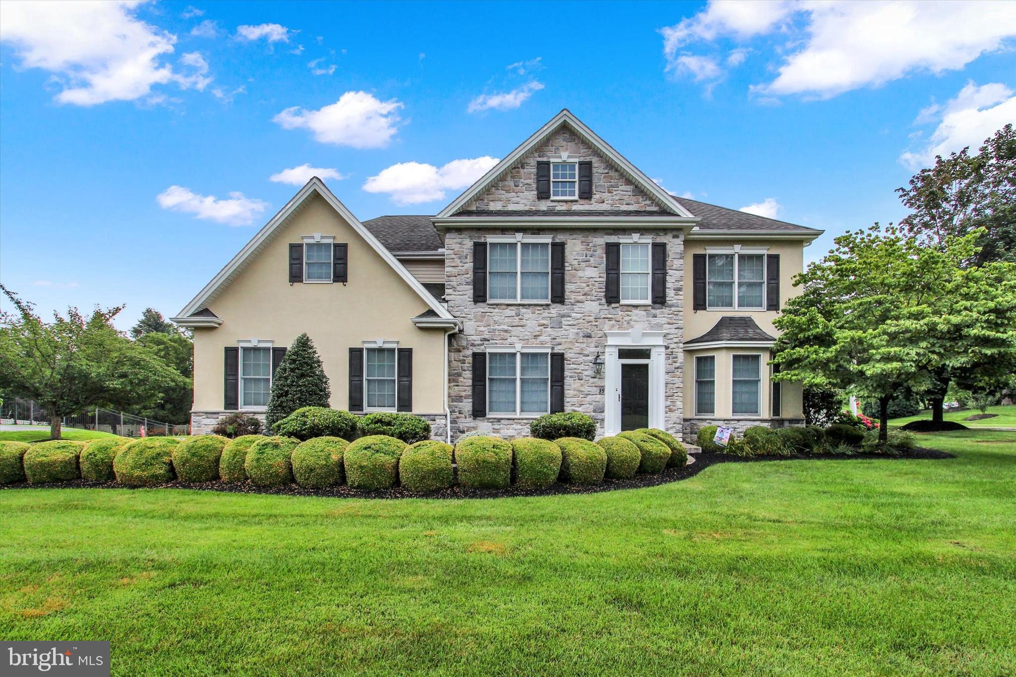 Welcome to this stunning Roland-built home nestled on a beautifully landscaped corner lot in the desirable Lindenwood community! Boasting over 4,000 square feet of finished living space, this meticulously maintained property combines timeless elegance with functional design. Step inside the soaring foyer with vaulted ceilings and crown molding and be greeted by the formal dining room adorned with tray ceiling, wainscotting, and custom window treatments. The living room features plush carpet, large bay window and leads into the spacious family room with a floor-to-ceiling gas fireplace. The kitchen with Kountry Kraft soft-close cabinetry, tile backsplash, recessed lighting, center island, and an eat in breakfast area with outdoor access provides a great location for entertaining guests. Upstairs, you’ll find four generous bedrooms, including a luxurious primary suite with attached en suite featuring a double vanity, whirlpool tub, and walk-in shower. One of the bedrooms also includes a separate bonus room area. The finished lower level offers even more space for entertaining or relaxing, along with ample storage. Enjoy the outdoors on the paver patio with hardscaped planters or unwind on the covered side deck, wonderful spaces to enjoy the outdoors. Recent updates include newer water heater (2019), central air (2019), and heat exchanger (2025). Conveniently located to shopping, dining and entertainment. Truly, a joy to own!