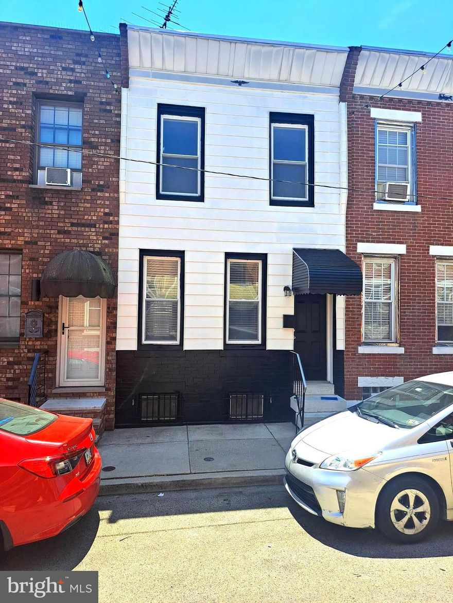 Welcome to a great street in South Philly — 330 Durfor street- a quiet street with beautiful lights strung from house to house that shine on warm summer evenings and cozy winter nights. This charming home is the perfect opportunity, located on a fabulous street with a true neighborhood feel.
Inside, you’ll find 2 bedrooms and 1 full bath, featuring an oversized bathroom with enough space to easily add upstairs laundry for added convenience. At the end of the street, enjoy the charm of a local church and school, while being just around the corner from The Bakery which adds to the warmth and character of the area.

A must-see home on a street that rarely becomes available!