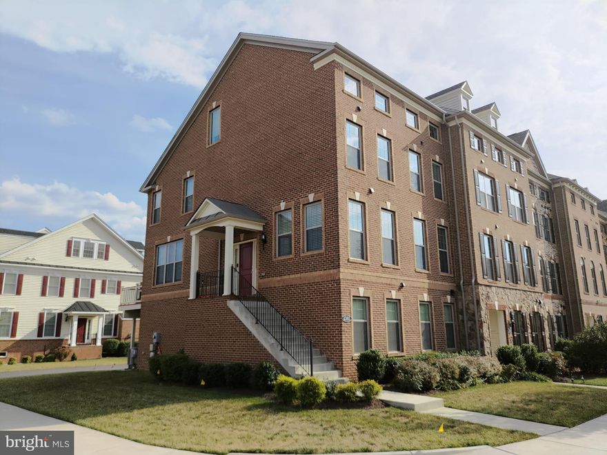 Location! Beautiful and Sunlit End-Unit 4-Level TownHouse with 4 Beds & 3 Full & 2 Half Baths in the Moorefield Station community. Features a gourmet kitchen with stainless steel appliances & a Large central island with a blacksplash. Hardwood flooring on the Main Level and an abundance of windows.  Large adjacent dining area, comfortable and large living room that leads to a large Trex deck. Spacious upper level bedrooms including a Master with a luxury bathroom with a soaking tub, loft on the 4th floor, lower level recreation/ bedroom with a wet bar, and more! Wonderful community amenities includes a swimming pool, gym and tot lot/playground.