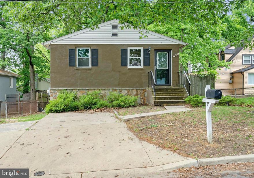 Well maintained rancher with 5 bedrooms and 2 full baths in Capitol Heights.   This warm and bright home was freshly painted last year and features an open floor plan with combined living and dining room  and  an eat-in modern kitchen featuring granite countertops, tiled backsplash and newer appliances.  The main level has the Primary 's bedroom with large closets, 2 more bedrooms and a full hallway bath.  The fully finished lower level is tiled  and a great space for a family or rec room with 2 more newly carpeted bedrooms  and a full bathroom. The HVAC system was replaced a few years ago, and all the pipes were replaced last year. The yard is fenced in and is a great place to spend time with family and friends this summer.  Located on the outskirts of DC it is  just a 2 block walk to Pennsylvania Avenue, and a short drive to Capitol Hill, and downtown D.C.  Being sold AS- IS.  Don’t miss out, schedule your tour today!