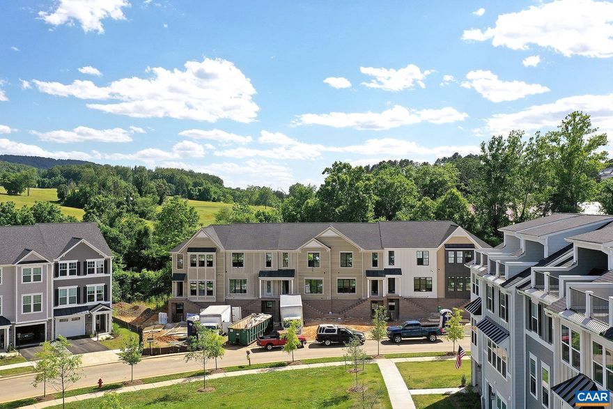 Take advantage of a $250 move-in discount by signing a lease before August 1st! Please note that this property is currently being built. In-person tours will be offered starting on July 25th. For a limited time, application fees have been lowered to $15 for our Galaxie Farm properties. Apply now to save $40 per person on application fees! **Income restrictions apply. See website for further details.**  This brand new 3 bedroom, 2.5 bath townhome is set within the Galaxie Farm community, located off of Scottsville Road and just south of downtown Charlottesville. Minutes from shops, restaurants, 5th Street Station,, the University of Virginia, and more. The community offers a playground, firepit area, stunning mountain views.  This 1,640 sqft attached home offers a bright interior, a chef's kitchen with quartz countertops, luxury vinyl plank flooring, an open main living area, a front-load washer and dryer on the bedroom level, a back deck, and driveway parking for two cars.  Rent includes: trash collection, exterior maintenance, and HOA fees. Occupancy is limited to no more than 3 unrelated individuals. No undergrads. *Please note that the completed exteriors shown are renderings. In-person tours are currently unavailable.