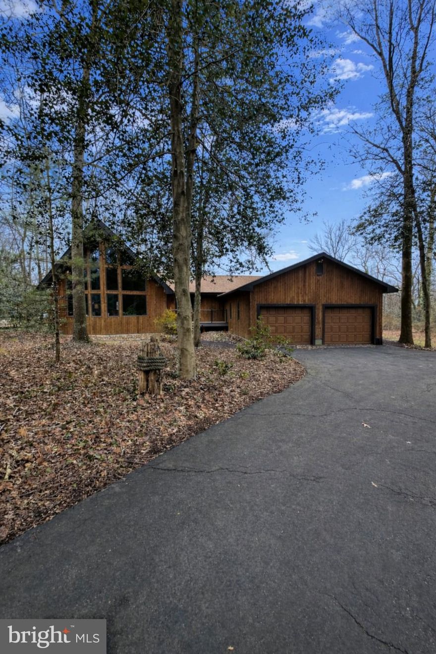 This 4-bedroom contemporary home is located in the water-access community of Creswell Forest. The main level features three bedrooms, while a beautiful wood spiral staircase leads to the upper-level primary suite with a full bath. Situated on nearly one wooded acre, the home offers peaceful views of the Elk River from the backyard. Community amenities include a private beach, boat ramp, and picnic area. Don’t miss this unique property.