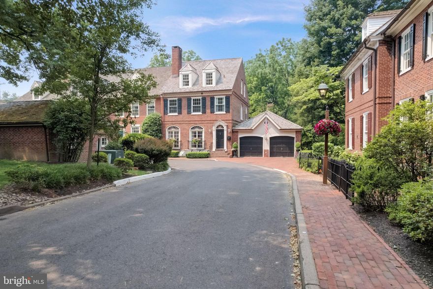 Beautifully recreated and updated Georgian style townhouse in the coveted enclave, Barclay Court. Not often do these 12 very special homes come available, Now is your opportunity, a second chance at Barclay Ct and this one is The Premium lot and Location. A grand and spacious home, warm and inviting from the Foyer entry with a classic black and white marble floor, you’ll find spaces reminiscent of Manhattan townhouses, a European bistro feel and of course classic Bucks County charm and character. The Living spaces on the main level are formal in nature, great for entertaining or a cozy night at home for two, the newer Kitchen and Breakfast nook take you to a new level of classic finish with glass front cabinets for you prized pieces to display, Gas Cooking, Viking Appliances, loads of storage, convenience and durability with soapstone counters. Take a seat in the breakfast nook and look out or step out back to the Serenity of the Patio for a break from your day, enjoy the lovely gardens or take a dip in the hot tub. Offering you 5 Bedrooms and 4.5 Baths, Upstairs are two levels of sleeping quarters, the primary bedroom suite is spacious and cozy, recently upgraded with a Dolomite marble bathroom that must be seen in person. The sitting room has been separated out to a home office space, this level also includes another bedroom suite with full bath tucked in there too. Two additional bedrooms and another full bathroom in timeless black and white tile décor offer a guest space, extra bedrooms for family or a nanny suite, Do not miss previewing the 3rd floor suite of rooms, storage and cedar closet.  The lower level is naturally lit with the skylights that top the terrarium nook spaces. The Family room has a gas fireplace and built ins, there’s a craft or sewing room, a bedroom and full bathroom. Additional storage and utility room here as well. Interior materials include extensive millwork and wainscoting throughout, solid wood closet organizers, site finished hardwood floors, various marbles utilized tastefully in several places, quality carpentry and attention to detail. Exterior amenities include a Newer Shake roof,  Marvin Ultimate Signature collection Windows, Standing seam copper roof on breakfast nook, a beautifully landscaped courtyard with a walled patio and slate walking paths, wood burning Fireplace, fountain and a built in, private hot tub. The 2 car garage is attached to the patio via an entry door and the home via entry to the foyer, the only home in Barclay Court with this convenient feature. A turn key home, ready to be your primary residence, a lock and leave home for your traveling lifestyle or this home can become your Bucks County Pied-a-terre. So close to everything in and around Newtown Borough that’s quaint with dining, shopping, community events and commuting, this home brings the whole package. Make Your Move today and come see for yourself.