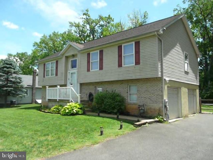 Very well maintained 3 bedroom 2 full bath single bilevel home with oversized attached two car garage on a private dead-end street.  Newer flooring throughout.  Kitchen with stainless steel appliances.  Brand new Heating/air conditioning system.  Dining room with sliding glass doors to trex deck.  Outside storage shed.  Large family room/office on the lower level and laundry room with utility tub.  Easy to show.