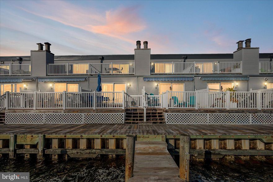 Introducing the Rusty Anchor Condominium, a truly captivating southern exposure, direct- bayfront 3-Bedroom property located on the serene 94th street in Ocean City, MD. This professionally designed condo offers breathtaking panoramic views of Ocean City and the downtown city skyline, ensuring a daily dose of awe-inspiring vistas and exclusive use of a private boat-slip (limited common element)!  

As you arrive, ample parking welcomes you, ensuring convenience for you and your guests. Nestled at the end of a quiet cul-de-sac street, this location offers a serene and peaceful ambiance, perfect for relaxation and tranquility.

Step inside and discover a comfortable and user-friendly two-floor layout, meticulously designed to cater to your every need. The bright and airy living spaces seamlessly flow from one room to another, creating an inviting atmosphere for both relaxation and entertaining.  

Beyond the walls of this exquisite condo lies a world of endless possibilities. Enjoy the convenience of being just a stone's throw away from a local city park, a dog park, and tennis courts, offering ample opportunities for outdoor activities and recreation. For the art enthusiasts, the nearby Ocean City Art League provides a haven for creativity and inspiration.

And when it comes to culinary adventures, you'll be spoilt for choice. Countless amazing restaurants are scattered throughout the area, offering a diverse range of cuisines to satisfy your every craving.

Embrace the coastal lifestyle at the Rusty Anchor Condominium, where captivating bay views, a comfortable layout, and a prime location come together to create the perfect retreat. Don't miss out on this exceptional opportunity to own a piece of paradise in Ocean City, MD. Schedule your private viewing today and embark on a journey of coastal living at its finest.