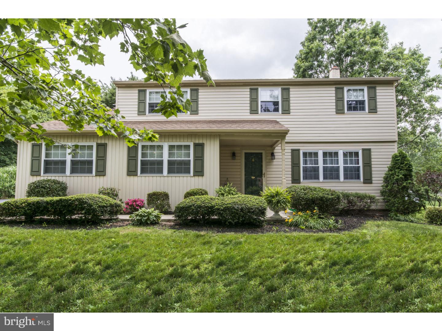 Welcome to this beautiful 4 bedroom  2.5 bathroom colonial situated on over a half acre in a mature family friendly neighborhood.  Walk along the newly replaced cement front walk and porch and admire the newer roof, windows and shutters throughout the exterior.  Enter into the tiled entry and formal living area surrounded by natural light!  Move into the formal dining room where entertaining is seamless.  The eat in kitchen provides all of your amenities to prepare wonderful meals and memories including all stainless  appliances, recessed lighting, replacement cabinetry and new cabinetry hardware, random width cherry floors and a breakfast bar!  The family room offers a new ceiling fan and beautiful brick wood burning fireplace with additional mantelpiece for those cold winter nights.  Walk out on to the patio through the Andersen sliding glass patio doors and enjoy the peace of the lush backyard also perfect for extended entertainment.  The second floor features a large master bedroom with custom walk in closet and master bathroom that has replacement tile and vanity.  The additional three bedrooms offer plenty of room and closet space along with a second full bath also with replacement tile and new vanity.  The attic has pull down steps, partial flooring and additional insulation.  A partial unfinished basement for your laundry area is ready for your finishing touches and is currently used for storage.  This well maintained home also features a two car attached garage for added convenience with a newly repaved driveway, recent curb replacement and driveway apron and some sidewalk replacement as well.  It doesn't end there!  This home also has a newer two zone heating system and central air!  It is located in the award winning North Penn School district.  Close to trails, parks, athletic fields, shopping, restaurants, and the PA turnpike you will find this property to be the perfect place to call home!  One Year Home Warranty included!