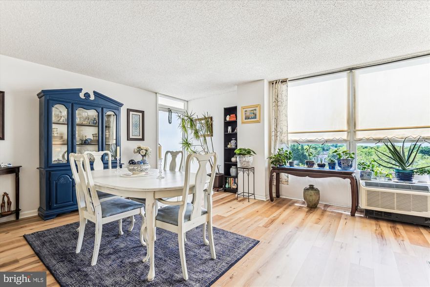 Bright and beautiful condo in The Ridgely, located in the heart of Towson. Impeccably maintained, 2 bedroom, 2 bath, 4th floor unit with 1 deeded parking space in the secure garage and 24 Hour Front Desk Staff.  Unit 403 features an open floor plan with luxury vinyl plank flooring throughout the living areas and the kitchen (installed 2023). The entry hall features a large coat coset with new doors. The remodeled  kitchen (2015) is open to the living area and features white, ceiling height cabinetry, granite counters & tile backsplash, undermount sink,  seating for 2 at the peninsula, a built-in microwave,  stainless steel appliances (all new in 2023), and a large pantry! The living and  dining areas are bathed in natural light and there is access to the balcony.   The hall bath has an updated vanity/ sink, large mirror and medicine cabinet. The laundry is located across from the hall bath and has loads of storage cabinets. The washer and dryer are newly replaced and the laundry closet doors are new as well. There is a linen closet in the hall. The primary bedroom has an-ensuite full bath and a  large walk-in closet. The primary bath has been updated with new vanity/sink and mirror. The second bedroom features a large walk-in closet.  The  condo features fresh neutral paint colors and flooring throughout. The central Towson location is close to shopping, dining,  public library, Baltimore County Government and Courthouse, hospitals, universities, public transportation and easy access to 695. The building has an outdoor pool, fitness room and plenty of guest parking available. The common areas are beautifully updated and decorated. There are no pending assessments. Renting is limited to relatives of unit owners.  See the virtual tour- click on the video camera icon at top of listing. This one is gem!