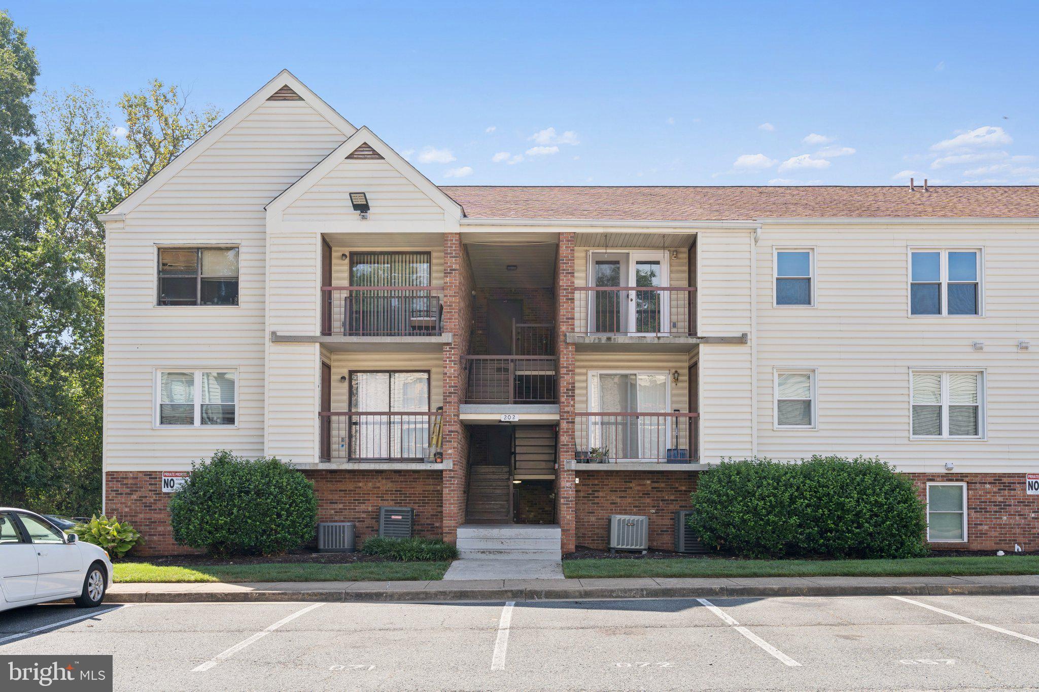 Welcome to effortless living in Stafford Meadows! This updated 2-bedroom, 1-bath condo offers the perfect blend of comfort, style, and convenience. Step inside to find new flooring, fresh neutral paint, and updated lighting. The bright and functional kitchen features newer countertops, a brand-new dishwasher (2025), and newer refrigerator and range, purchased in 2022. The HVAC system was replaced in 2024, and the water heater is just two years old (2023), giving you peace of mind for years to come. Both bedrooms are well-sized. Enjoy in-unit laundry, two assigned parking spaces, and a chill balcony for relaxing and enjoying an evening drink of choice. You'll love the location—just minutes from shops, dining (CFA ftw, but hit up Umi for fantastic sushi), commuter lots, and more. Whether you're starting out or simplifying your lifestyle, this home is move-in ready and made for easy living.
