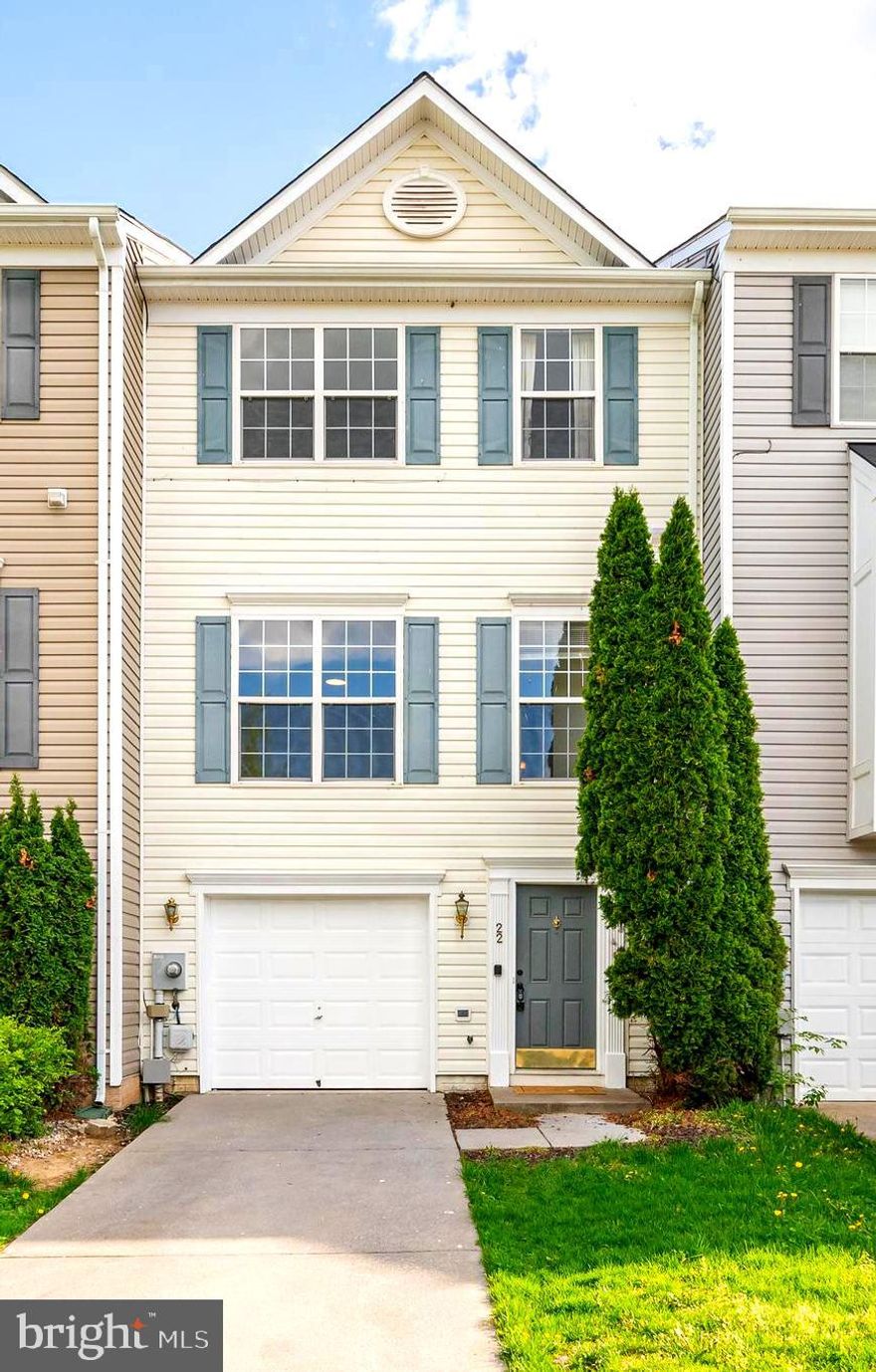 JUST REDUCED $15K, Don't miss out, call for your private tour.    Welcome to your tastefully remodeled three-story townhouse in the heart of Inwood, WV. This meticulously updated home offers comfort, convenience, and modern elegance throughout.

As you step inside, you're greeted by a fresh ambiance, with new carpet, paint,  with ceramic tile entrance and luxury vinyl plank flooring guiding you through the space. The main level boasts an inviting kitchen and dining room combo, perfect for hosting gatherings or enjoying everyday meals. The kitchen features  include a gas stove, complemented by a convenient pantry for ample storage.

The oversized living room provides an ideal space for relaxation and entertainment, offering versatility for various furniture arrangements and decor styles. Natural gas heating and cooking ensure efficiency and ease of living.

Venture upstairs to discover the serene retreat of the primary bedroom, featuring a cathedral ceiling and a spacious walk-in closet. The attached primary bathroom is a sanctuary unto itself, boasting a luxurious soaking tub, a separate shower with ceramic tile accents, dual vanities, and ceramic tile flooring.

The lower level of this townhouse offers additional functionality and entertainment options, with a half bath, a den area, and direct access to a charming patio outside, perfect for alfresco dining or hosting guests. The lower level features beautiful ceramic tile flooring in hallway adding both durability and style to the space. The attached one-car garage provides added convenience and storage space.

Located in a desirable neighborhood, this townhouse offers the perfect blend of modern amenities and comfort. Don't miss the opportunity to make this your new home sweet home in Inwood, WV.