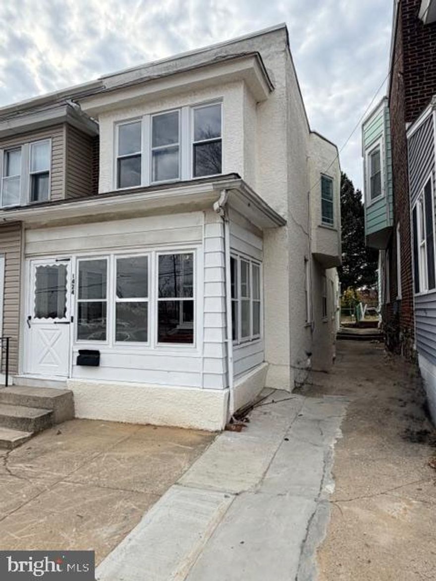 This charming twin home in the heart of Linwood offers a perfect blend of classic character and modern comfort. Built in 1936 and renovated in 2025, this residence features four spacious bedrooms and two full bathrooms, making it an ideal space for gatherings and relaxation. Step inside to discover new vinyl plank flooring that flows seamlessly throughout, complemented by upgraded countertops in the kitchen, which boasts a cozy table space for casual dining. The family room, conveniently located off the kitchen, invites warmth and connection. Outside, enjoy the level rear yard, perfect for outdoor activities or evenings under the stars. The property is situated across the street from Linwood elementary school in a neighborhood with sidewalks that encourage strolls and community engagement. Linwood is known for its welcoming atmosphere, with nearby parks offering green spaces for recreation and relaxation. With a city view and a prime location in the middle of the block, this home is not just a place to live, but a place to thrive. Close proximity to neighboring tax free shopping in Delaware. On-street parking adds convenience, while the unfinished basement provides potential for customization to suit your needs. New sewer line installed and 1 year home warranty will be provided at closing with full price offers.